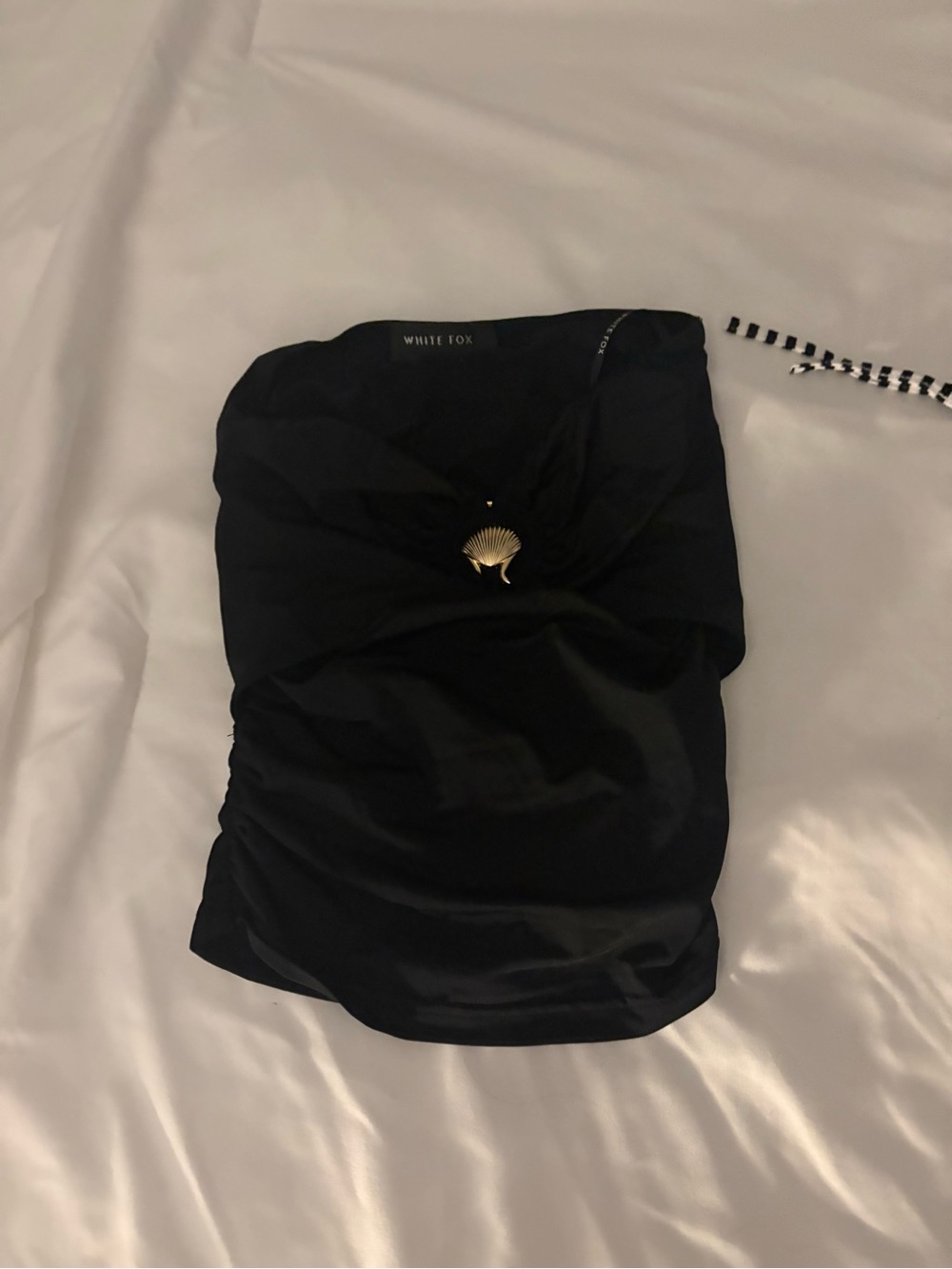 White Fox Boutique Black Strapless Dress with Gold Shell Detail
